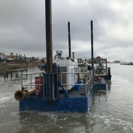back view of dredging boat