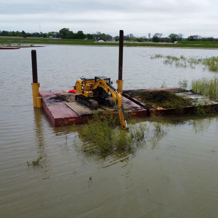 back view of dredging boat